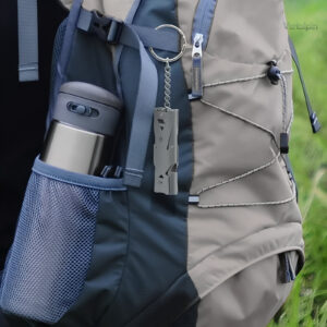Sifflet de secours compact, idéal pour situations d'urgence